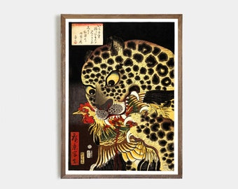 May include: A framed print of a Japanese woodblock print featuring a leopard with yellow eyes and black spots, attacking a rooster. The rooster has red, yellow, and green feathers. The background is black.