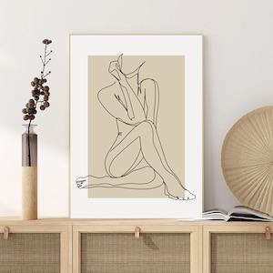 Puede incluir: Un dibujo de l&iacute;nea de una persona sentada con las piernas cruzadas, sobre un fondo beige. El dibujo est&aacute; en blanco y negro.