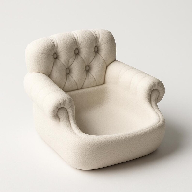May include: A small, off-white upholstered armchair with a tufted back and rolled arms. The chair has a low profile and a rounded seat, suitable for a child's room or a cozy corner.