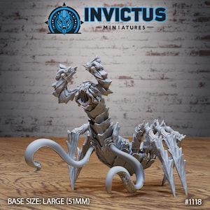 May include: A grey, unpainted resin miniature of a multi-legged creature with a segmented body, sharp claw-like appendages, and a central head with an open mouth. The text INVICTUS MINIATURES and BASE SIZE: LARGE (51MM) #1118 are visible.