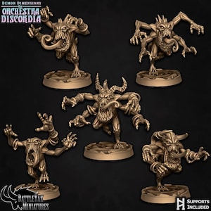 May include: Five bronze-coloured miniature demon figures are displayed. Each figure has a grotesque, open-mouthed face with sharp teeth and a long tongue. The figures are posed in dynamic stances, with outstretched arms and clawed hands. The bases are circular.