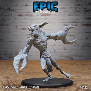 May include: A gray miniature figure of a monster with large claw-like hands and a grotesque face. The figure is on a black base, with the text "EPIC Miniatures" at the top. The base size is large (51mm).