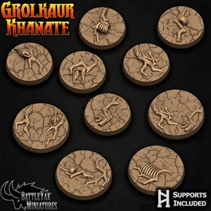 May include: Ten circular miniature bases with a cracked earth effect, each featuring bone-like structures. The bases display the text "GROLKAUR KHANATE" and "BATTLEYAK MINIATURES". The phrase "SUPPORTS INCLUDED" is also visible.