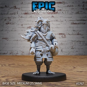 May include: A grey, detailed miniature figurine of a humanoid figure with horns, a long beard, and a long, flowing mane of hair. The figure is wearing a robe and holding a bottle in one hand and a staff in the other. The figure is standing on a black base. The base is labelled "BASE SIZE: MEDIUM (25.5MM)" and "#3767".