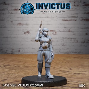 May include: A gray miniature figure of a soldier in a helmet and gas mask, holding a rifle. The figure is standing on a black base. The text "INVICTUS -MINIATURES-" is at the top. The base size is medium (25.5mm).