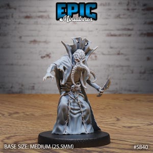 May include: A gray miniature figure of a robed creature with tentacles and a knife. The figure is on a black base, with the text "EPIC Miniatures" at the top. The base size is medium (25.5mm).