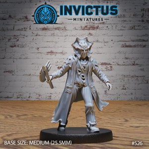 May include: Gray plastic miniature figure of a humanoid creature with a large head and a coat, holding a weapon. The figure is standing on a black base.  INVICTUS MINIATURES #526 BASE SIZE: MEDIUM (25.5MM)