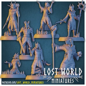 May include: A set of six grey painted miniature figurines of fantasy characters, each with horns and wearing robes. The figurines are posed in various action poses, holding weapons and staffs. The figurines are arranged on a grey background with the text "Lost World Miniatures" printed below.