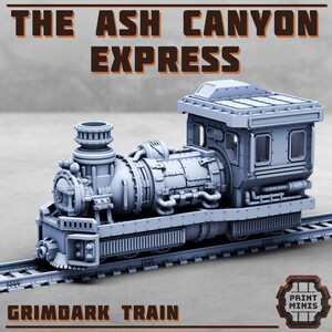 May include: A gray model train with the text "THE ASH CANYON EXPRESS" and "GRIMDARK TRAIN". The train is on a track and has detailed mechanical components. The model is a Print Minis product.