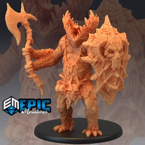 May include: A detailed miniature figurine of a monstrous creature with a large mouth, sharp teeth, and a spiked shield. The creature is wearing a bone necklace and a belt with skulls. The miniature is painted in a light brown colour.