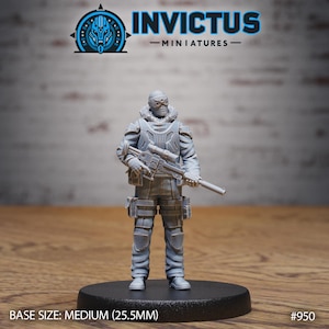 May include: A gray miniature figure of a soldier holding a rifle, standing on a black base. The figure is wearing a tactical uniform with a helmet and goggles. The text "INVICTUS - MINIATURES" is at the top. The base size is medium (25.5mm).