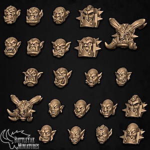 May include: A set of 20 miniature plastic Orc heads in various poses and expressions. The heads are painted in a gold color and are suitable for use in tabletop games or as decorative pieces.