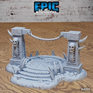 May include: A grey 3D printed miniature of a stone altar with two pillars, a chain, and skulls. The altar is surrounded by bones and grass. #4999