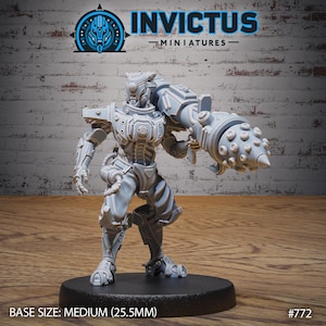 May include: A gray, detailed, plastic miniature of a robot with a large drill weapon. The robot is standing on a black base. The miniature is labeled "INVICTUS MINIATURES" and "#772".