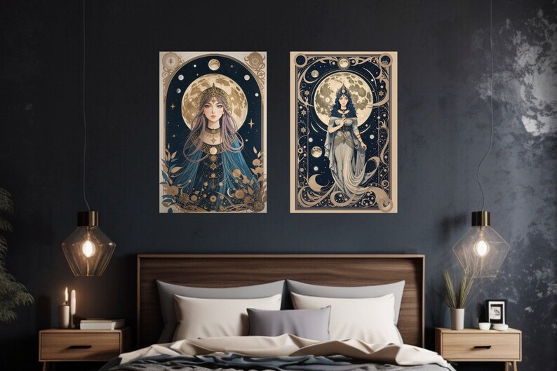 May include: Two framed art prints with a celestial theme. Each print features a woman in a flowing gown standing in front of a crescent moon. The background is a dark blue with gold stars and swirls.