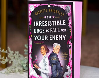 Pink Sprayed Edge - The Irresistible Urge to Fall For Your Enemy by Brigitte Knightley