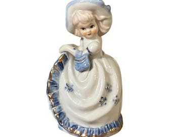 Girl In Bonnet With Blue and Gold Colored Accents Vintage Ceramic Figurine 5"