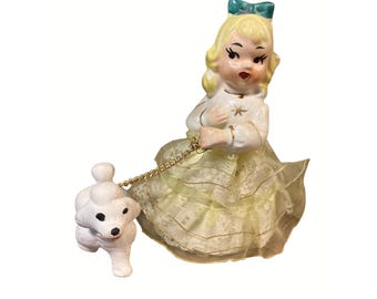 Ceramic Girl Figurine With Dog and Chain Yellow Dress Made In Japan Vintage