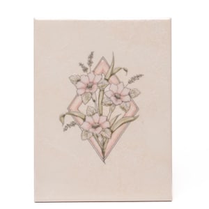 May include: A rectangular, off-white canvas features a floral illustration. The artwork showcases pink flowers, green leaves, and sprigs of lavender, all enclosed within a pink diamond shape. The overall design has a soft, watercolor-like aesthetic.