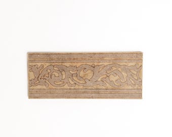 decorative tile liner. 4 in x 9 3/4 in  (made in Uruguay)