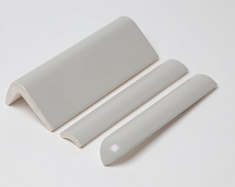 Classic Gray ceramic V-cap, Quarter round and Quarter round corner