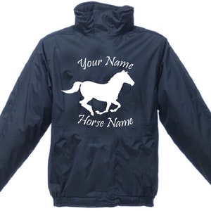 May include: A navy blue jacket with a white silhouette of a horse running. The text "Your Name" and "Horse Name" is printed on the jacket.