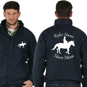 May include: A navy blue jacket with a white silhouette of a rider on a horse. The text "Rider Name" and "Horse Name" is printed on the back of the jacket.