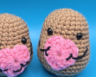 Patata positiva con corazón y cita