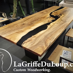 Custom-made designer tables (dining or coffee) in Caucasian walnut, and industrial base.