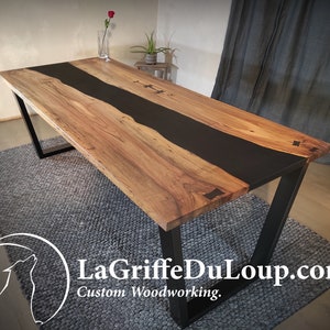 Custom-made river table (dining or coffee) in walnut, black epoxy resin and ebony butterfly.