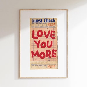 May include: A vintage-style guest check with the words "LOVE YOU MORE" written in red on a white background. The check has a blue header that says "Guest Check" and the number "051197" printed on it.