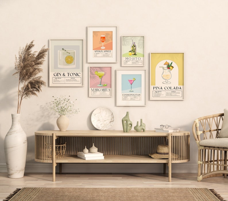 May include: Six printable cocktail posters featuring illustrations of various drinks, including a gin and tonic, an Aperol spritz, a mojito, a margarita, a cosmopolitan, and a pina colada. Each poster displays the name of the drink and a list of ingredients.