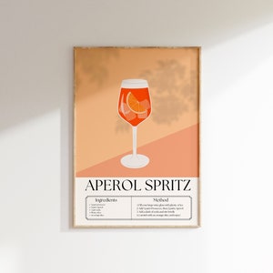 May include: A printable poster with an orange background and a glass of Aperol Spritz. The poster includes the ingredients and method for making the cocktail. The text reads "Aperol Spritz", "Ingredients", and "Method".