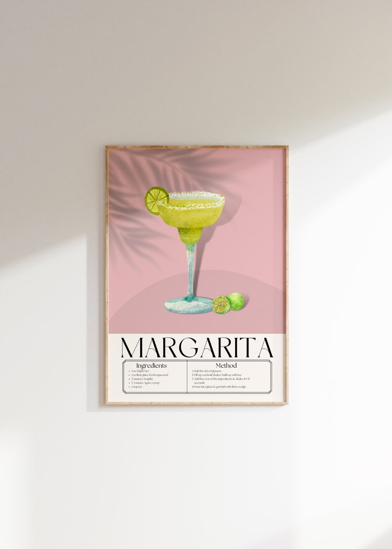 May include: A printable poster with a pink background and a watercolour illustration of a margarita cocktail. The poster includes the title "Margarita" and a list of ingredients and instructions for making the drink.