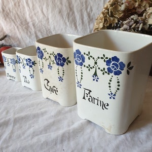 Set von 4 französischen Vintage-Küchen-Keramikkanistern Jugendstil / Pariser Eiffelturm mit violettem Blumenmotiv um 1910 Frankreich, absteigende Größe