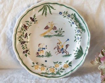 Moustiers French hand painted 19thC plate grotesques / birds / floral, scalloped edge, earthenware in green, brown, yellow ochre & blue