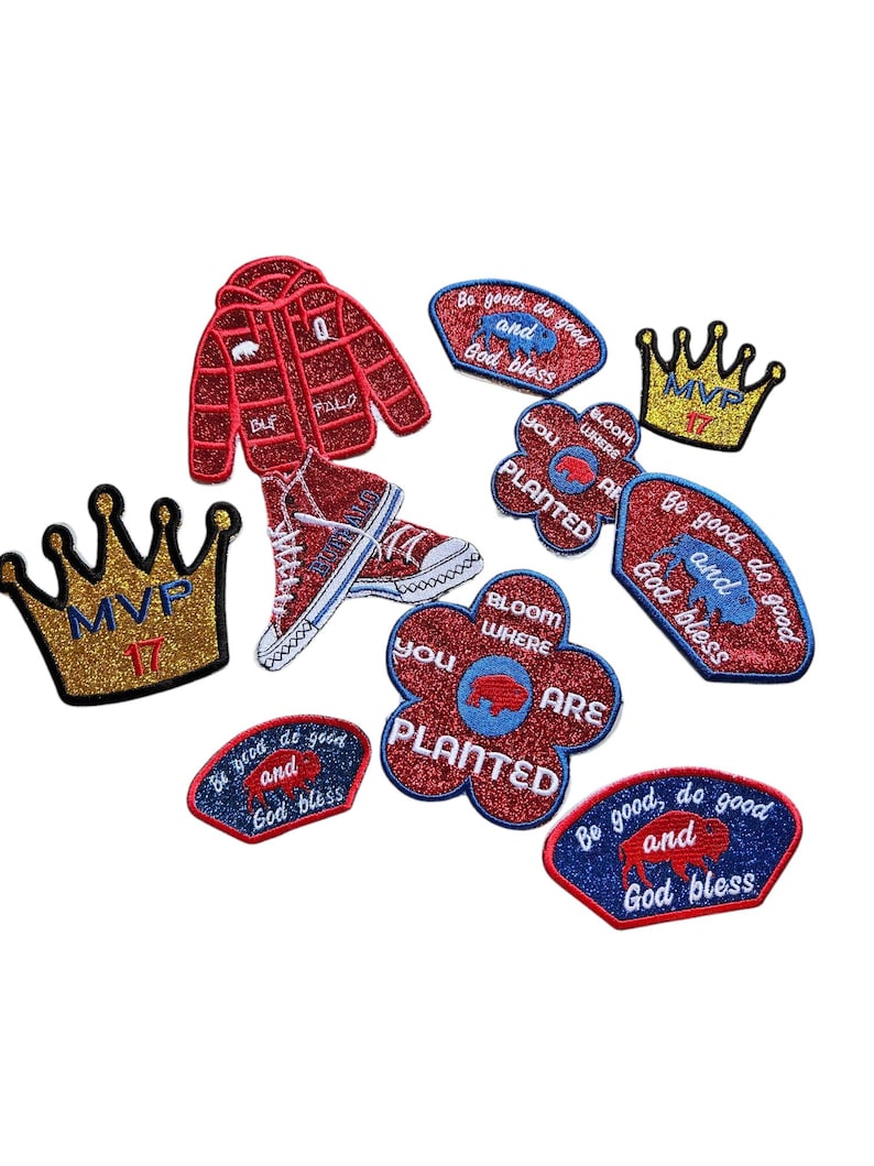May include: A selection of embroidered patches in diverse forms. Designs feature a red jacket, trainers, crowns with "MVP 17", and floral shapes with text such as "Bloom Where You Are Planted" and "Be good, do good and God bless."