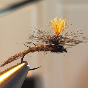 3- Parachute Floating Nymph Fly.  Dry Flies.