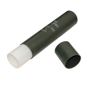 May include: A green cylindrical tube with a white inner tube. The tube has the text "60 LM60 T 10-118 N 152t" printed on the side.