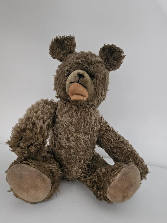 Osito de peluche antiguo con boca abierta, osito de peluche