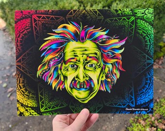 May include: A psychedelic print of Albert Einstein with rainbow hair and a black and white mandala background. The print is titled "Chandler Broaddrick Artwork".