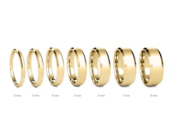 May include: A set of seven 14K yellow gold wedding bands in different widths, ranging from 2 mm to 8 mm. The bands are all polished and have a smooth, rounded edge.
