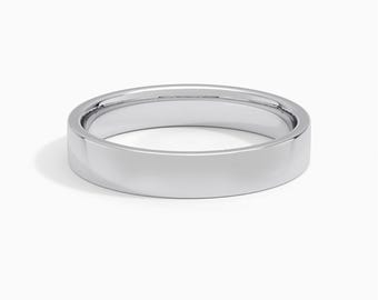May include: A polished, silver-colored ring with a flat, rectangular band. The ring is set against a white background, highlighting its smooth, reflective surface. The ring's design is simple and modern.