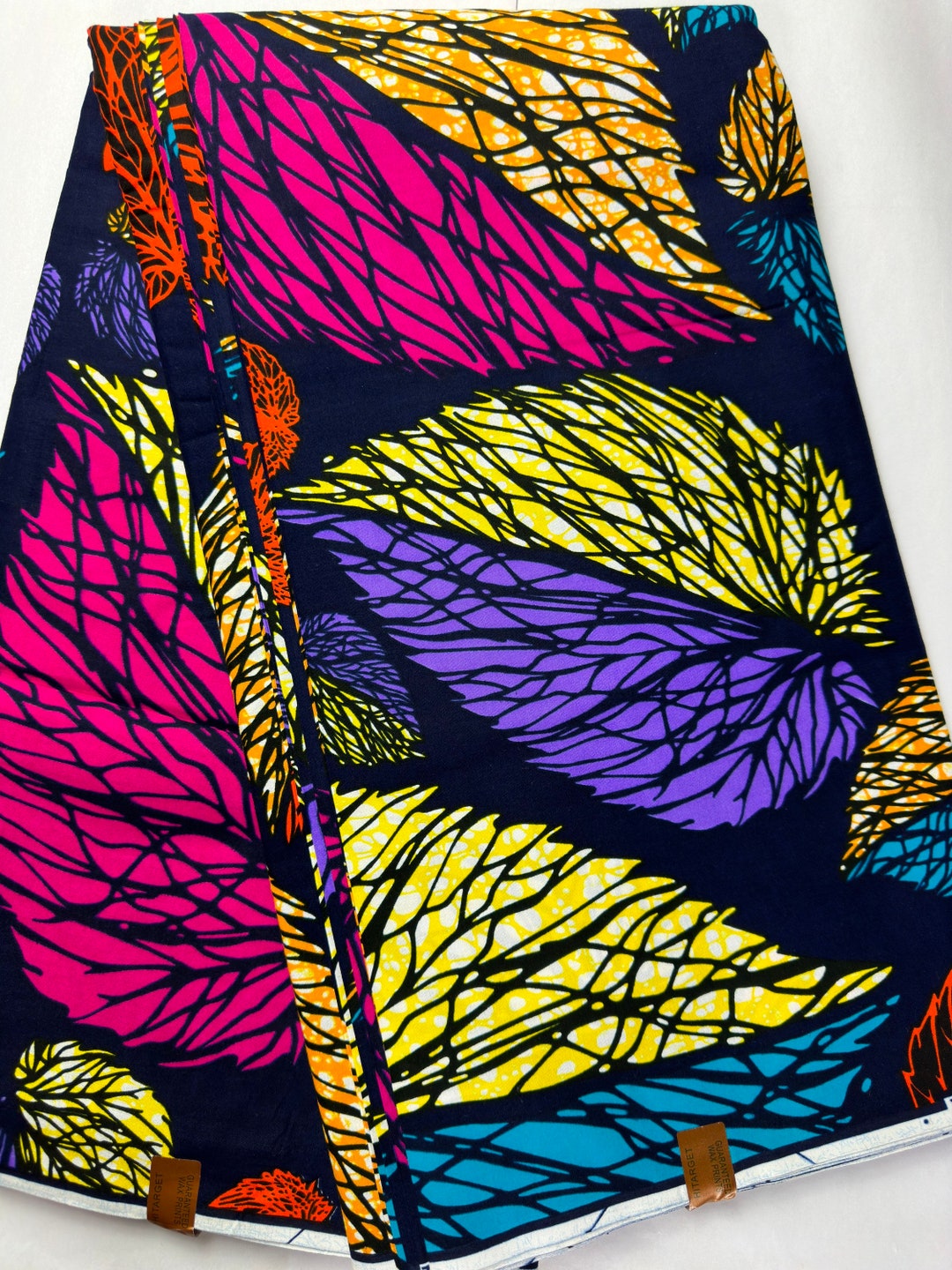 Black Ankara Fabric with Purple Spiral and Green Wave Design