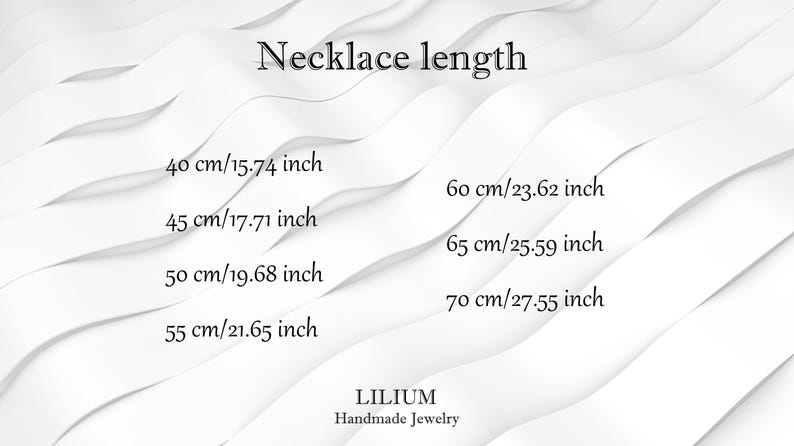 May include: A white graphic chart titled Necklace length listing measurements in centimeters and inches: 40 cm/15.74 inch, 45 cm/17.71 inch, 50 cm/19.68 inch, 55 cm/21.65 inch, 60 cm/23.62 inch, 65 cm/25.59 inch, 70 cm/27.55 inch, with LILIUM Handmade Jewelry text.
