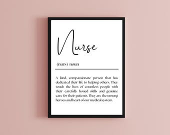 May include: A framed print with the word "Nurse" in elegant script. Below, the definition describes a compassionate person dedicated to helping others. The black frame contrasts against a soft pink background.