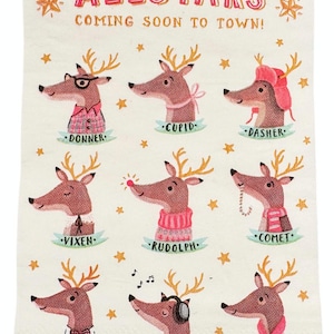 May include: A white card with a scalloped edge features a festive illustration of Santa's reindeer. The reindeer are depicted in various poses, wearing colorful clothing and accessories. The text "NORTH POLE. ALLSTARS COMING SOON TO TOWN!" is printed in red and pink letters at the top of the card. The names of each reindeer are printed below their images: Donner, Cupid, Dasher, Vixen, Rudolph, Comet, Prancer, Dancer, and Blitzen.