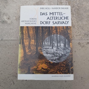 May include: A book cover with a photo of a forest and the text "FONTES ARCHAEOLOGICI HUNGARIAE IMRE HOLL-NÁNDOR PARADI DAS MITTEL-ALTERLICHE DORF SARVALY AKADEMIAI KIADÓ, BUDAPEST"