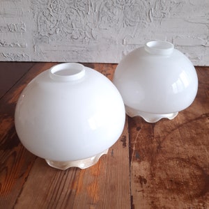 Two vintage glass lampshades. Retro sconces made of milky white glass. Glass for hanging chandeliers or sconces. Ceiling lampshades.