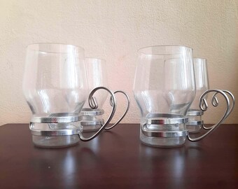 Set of 4 Vintage glass tea cups with metal stands.